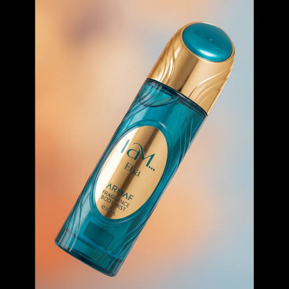 Detalhe do frasco do perfume Body Mist I Am Eba Feminino - Armaf com foco no vidro e no líquido